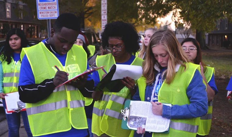 students conduct walk audit to address safety concerns