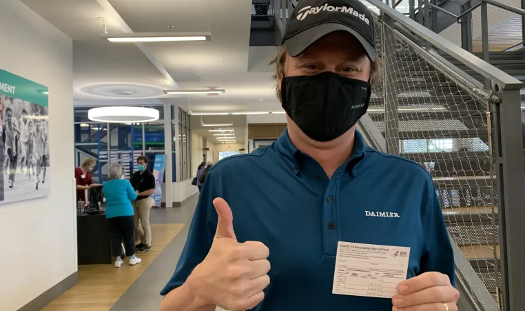 Y member gets vaccinated at Gaston y