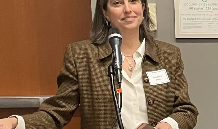 picture of Liz Lord presenting at conference