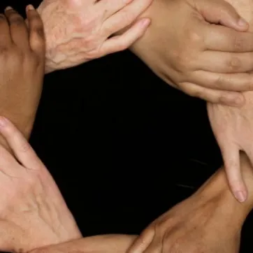 diverse hands holding together