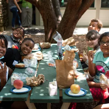 children having health food at the Y