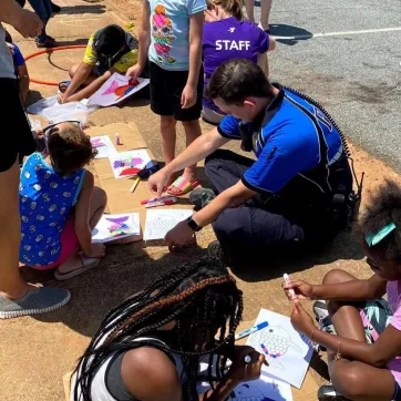 y staff and police engage with kids